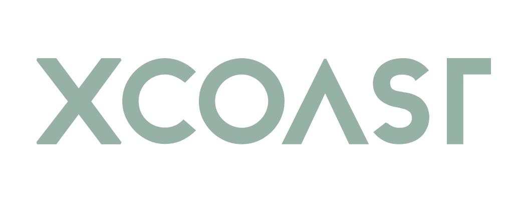 XCOAST DE logo
